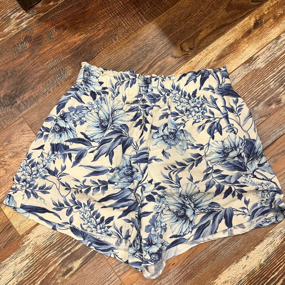 Medium blue and white floral shorts from H&M